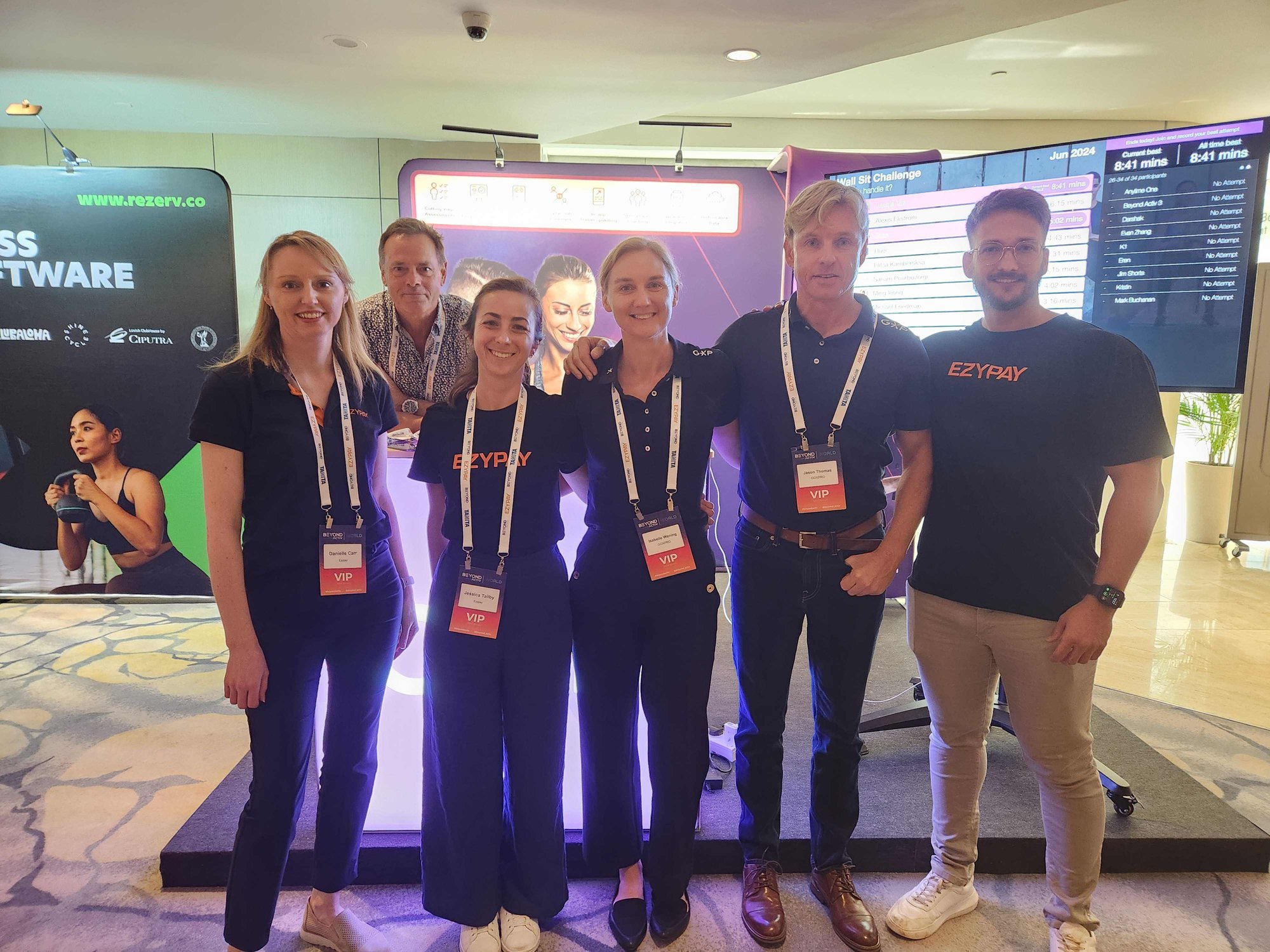 Ezypay posing with representatives of GoXPro at Beyond Activ World 2024