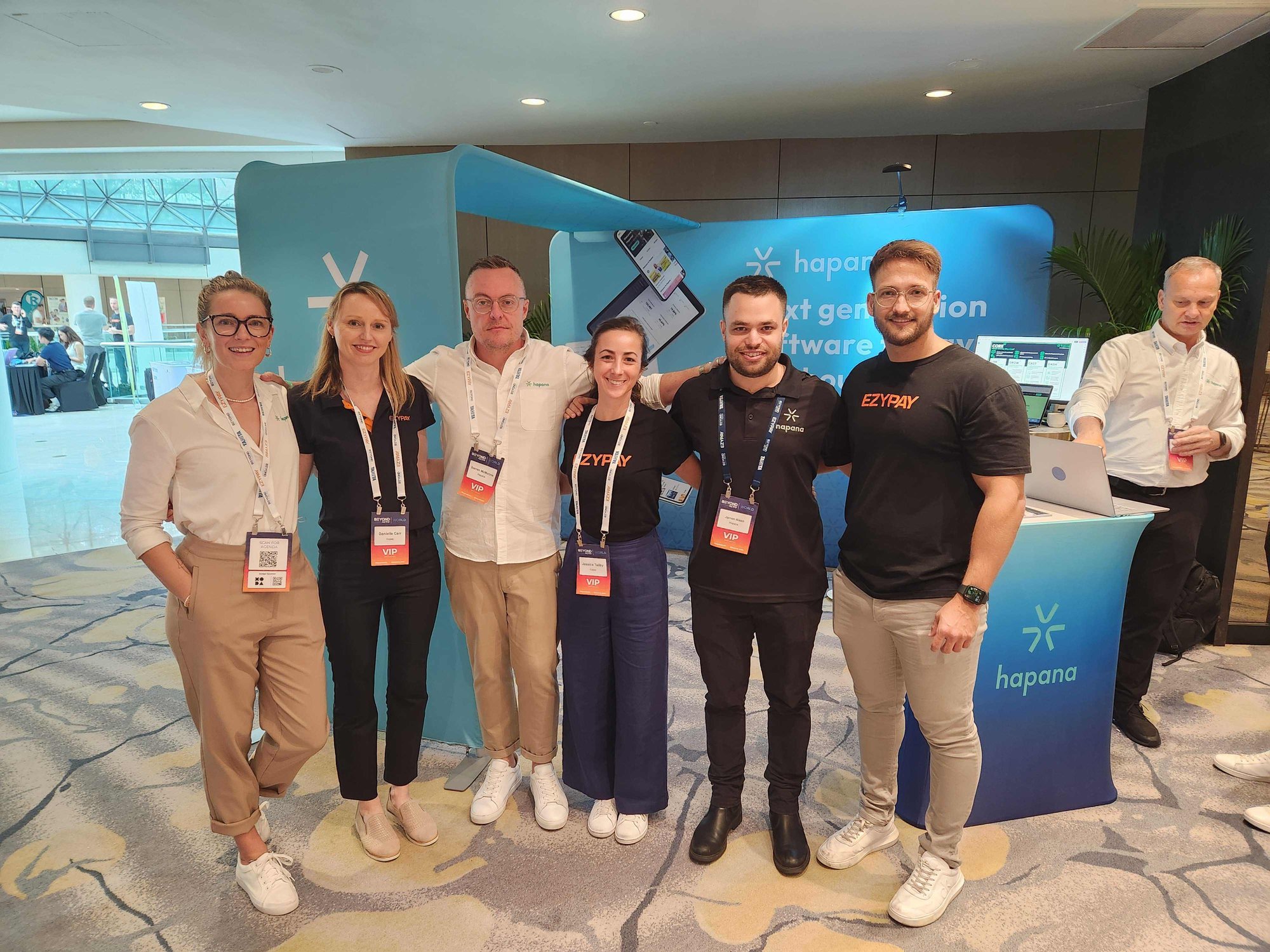 Ezypay posing with representatives of Hapana at Beyond Activ World 2024