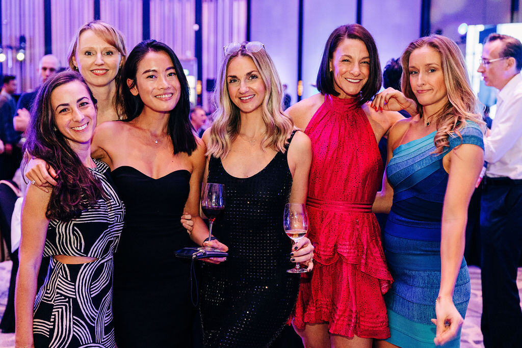 A group of people holding drinks at the Beyond Activ World 2024 awards ceremony