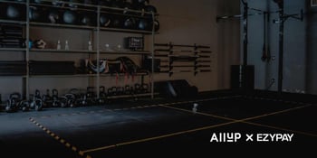 A shot of the interior of a gym. The logos for Ezypay and partner Allup appear in the bottom right hand corner. 